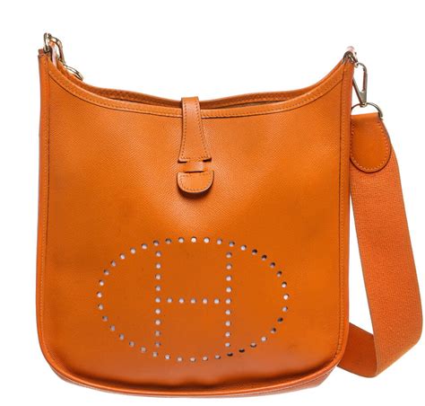 orange hermes evelyn crossbody with blue strap|neo evelyne 29 bag.